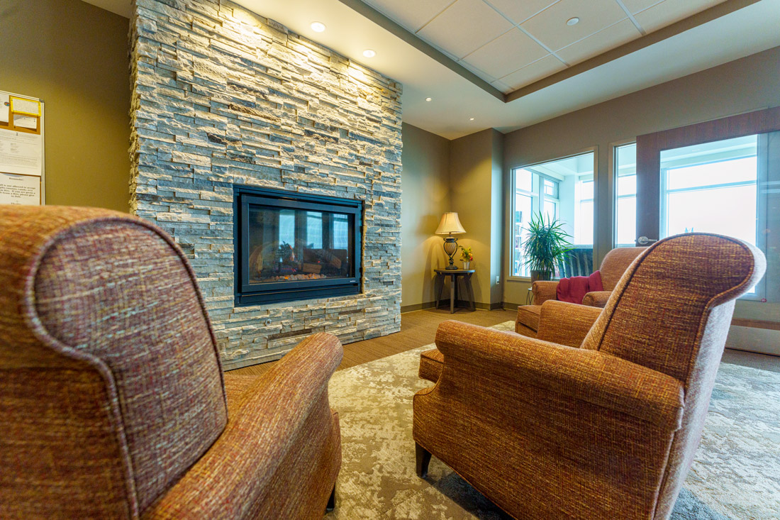 Bayside View Sitting Area with a modern fireplace